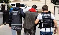 Siirt’te İran Plakalı Aracın Dorsesinde Düzensiz Göçmen ve Uyuşturucu Ele Geçirildi