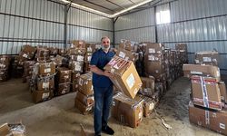 Dilaver Tanık, Antalya'da İhtiyaç Sahibi Ailelere 100 Bin Parça Giysi Dağıttı
