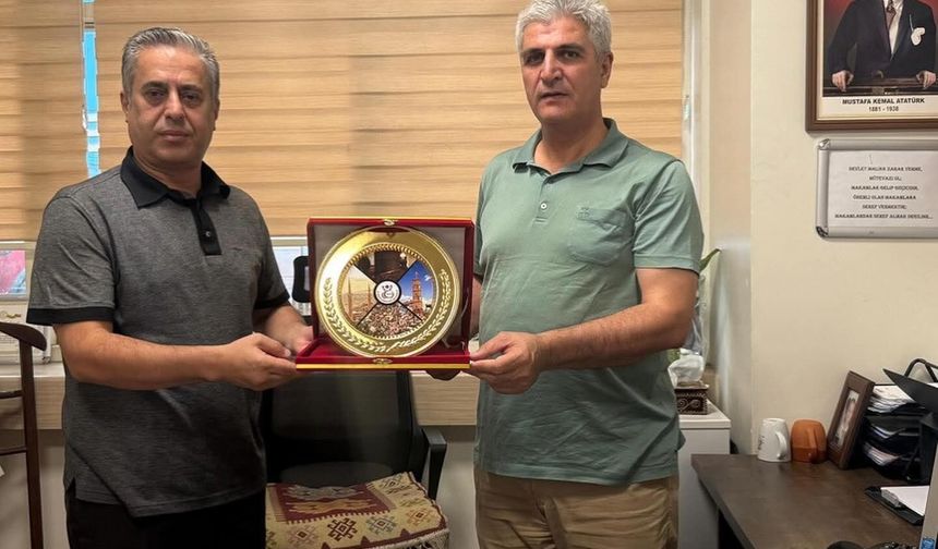 Şener Tanık’a Plaketli Tebrik Ziyareti